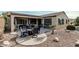 Spacious backyard patio, perfect for outdoor dining and relaxation at 15452 W Skyview Way, Surprise, AZ 85374