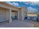 Covered patio with seating area, perfect for relaxing outdoors at 15665 W Azalea Ln, Surprise, AZ 85374