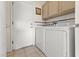 Laundry room with washer, dryer, and exterior access at 15665 W Azalea Ln, Surprise, AZ 85374