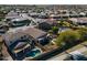 Neighborhood view of the home and pool at 17680 W Lilac St, Goodyear, AZ 85338