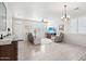 Bright and spacious living room with tile floors at 17680 W Lilac St, Goodyear, AZ 85338