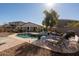 Inviting backyard with a refreshing pool at 17680 W Lilac St, Goodyear, AZ 85338