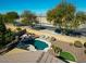 Inviting backyard oasis with a sparkling pool and ample seating at 17680 W Lilac St, Goodyear, AZ 85338