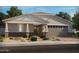 Single-story home with two-car garage and attractive landscaping at 17685 W Southgate Ave, Goodyear, AZ 85338