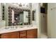 Double vanity bathroom with large mirror and plants at 1806 E Ellis St, Phoenix, AZ 85042