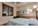 Bedroom with queen bed, ceiling fan, and window at 1806 E Ellis St, Phoenix, AZ 85042