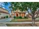 Two-story house with a tree in front and a manicured lawn at 1806 E Ellis St, Phoenix, AZ 85042