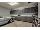 Organized garage with ample storage cabinets and space for a car at 1806 E Ellis St, Phoenix, AZ 85042