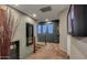 Upper hallway with glass railings, carpet, and natural light at 1806 E Ellis St, Phoenix, AZ 85042