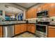 Modern kitchen, equipped with stainless steel appliances at 1806 E Ellis St, Phoenix, AZ 85042