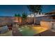 Private backyard pool with a built-in bar and seating area at 1806 E Ellis St, Phoenix, AZ 85042