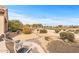 Relaxing backyard oasis with golf course view and patio seating at 18137 N Estrella Vista Dr, Surprise, AZ 85374