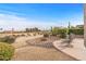 Spacious backyard patio overlooking the golf course at 18137 N Estrella Vista Dr, Surprise, AZ 85374