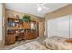 Guest bedroom with built-in shelving and desk at 18137 N Estrella Vista Dr, Surprise, AZ 85374