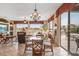 Casual dining area with glass table and golf course views at 18137 N Estrella Vista Dr, Surprise, AZ 85374