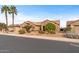 Single-story home with desert landscaping and a two-car garage at 18137 N Estrella Vista Dr, Surprise, AZ 85374