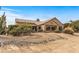 House exterior showcasing a large window and desert landscaping at 18137 N Estrella Vista Dr, Surprise, AZ 85374