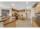 Bright kitchen featuring wood cabinets and modern appliances at 18137 N Estrella Vista Dr, Surprise, AZ 85374