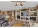 Spacious living room featuring built-in shelving and a cozy sitting area at 18137 N Estrella Vista Dr, Surprise, AZ 85374