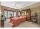 Main bedroom with a king-size bed and bay window at 18137 N Estrella Vista Dr, Surprise, AZ 85374