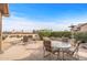 Spacious patio with seating area and golf course views at 18137 N Estrella Vista Dr, Surprise, AZ 85374