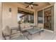 Cozy patio with seating area and view into the home at 18137 N Estrella Vista Dr, Surprise, AZ 85374