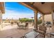 Outdoor patio with seating area and a view of the golf course at 18137 N Estrella Vista Dr, Surprise, AZ 85374