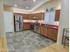 Modern kitchen with stainless steel appliances and red countertops at 18803 N 16Th Pl, Phoenix, AZ 85024