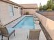 Refreshing pool with stone accents and comfortable seating at 18803 N 16Th Pl, Phoenix, AZ 85024