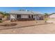 Charming single-story home featuring a rock facade and a xeriscape yard at 1940 S Coconino Dr, Apache Junction, AZ 85120