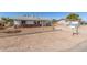 Charming single-story home featuring a rock facade and a xeriscape yard at 1940 S Coconino Dr, Apache Junction, AZ 85120