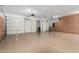 Two-car garage with epoxy floors and extra storage at 20652 N Wishing Well Ln, Maricopa, AZ 85138