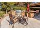 Relaxing patio with seating area and built-in grill at 20652 N Wishing Well Ln, Maricopa, AZ 85138