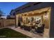 Relaxing backyard patio with fire pit and seating area at 23219 N 41St St, Phoenix, AZ 85050