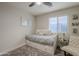 Cozy bedroom with built-in drawers and sitting chair at 23219 N 41St St, Phoenix, AZ 85050