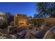 Inviting backyard fire pit perfect for outdoor gatherings at 23219 N 41St St, Phoenix, AZ 85050