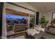 Living room with sliding glass doors leading to the backyard at 23219 N 41St St, Phoenix, AZ 85050