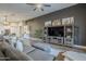 Open living room features a view into the kitchen and dining area at 23219 N 41St St, Phoenix, AZ 85050