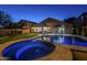 Stunning pool and spa area with patio furniture and a covered patio at 23219 N 41St St, Phoenix, AZ 85050