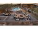 Resort-style pool and fire pit area with seating at 23718 N 126Th Pl, Scottsdale, AZ 85255