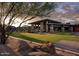 Expansive community lawn with modern clubhouse in the background at 23766 N 123Rd Way, Scottsdale, AZ 85255