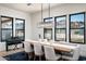 Bright dining room with large windows and wooden table at 23766 N 123Rd Way, Scottsdale, AZ 85255