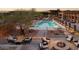 Resort-style pool with fire pit and lounge seating at 23766 N 123Rd Way, Scottsdale, AZ 85255