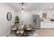 Kitchen with a dining area featuring a round table and chairs at 25636 S Howard Dr, Sun Lakes, AZ 85248