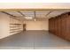 Two-car garage with built-in shelving and storage at 25636 S Howard Dr, Sun Lakes, AZ 85248