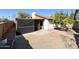 Backyard with covered patio and storage shed at 2615 W Hearn Rd, Phoenix, AZ 85023