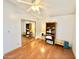 Bedroom with mirrored closet doors and wood floors at 2615 W Hearn Rd, Phoenix, AZ 85023