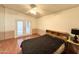 Bright bedroom with double doors leading to exterior at 2615 W Hearn Rd, Phoenix, AZ 85023