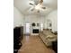 Living room features a fireplace and ceiling fan at 2615 W Hearn Rd, Phoenix, AZ 85023