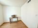 Small spare bedroom with wood floors and a console table at 2615 W Hearn Rd, Phoenix, AZ 85023